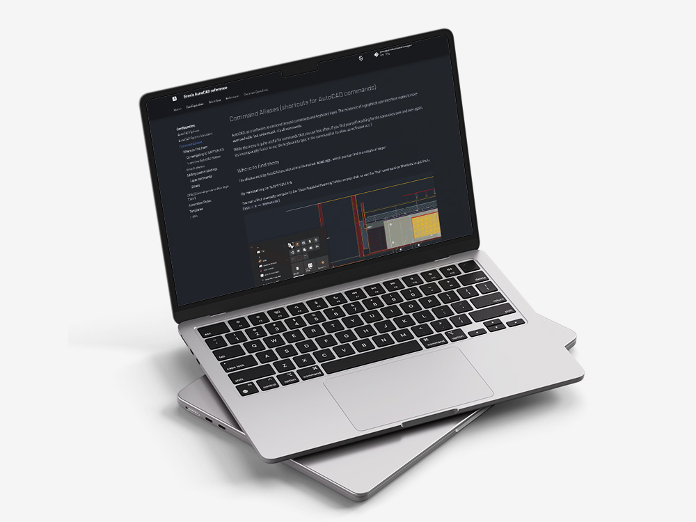 ACADMOS displayed on stacked laptops.